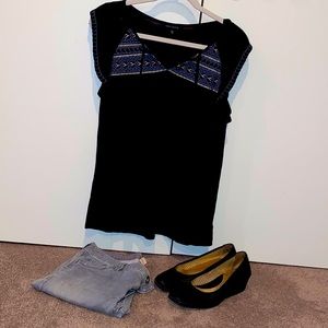 Size medium black sanctuary top with ruffle sleeve, tie front and embroidery